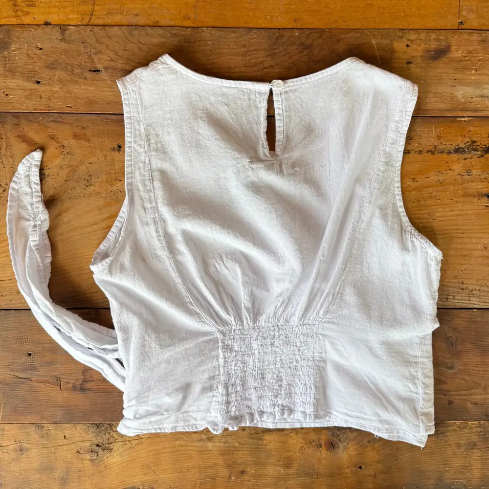 Sleeveless Cinched Waist Blouse