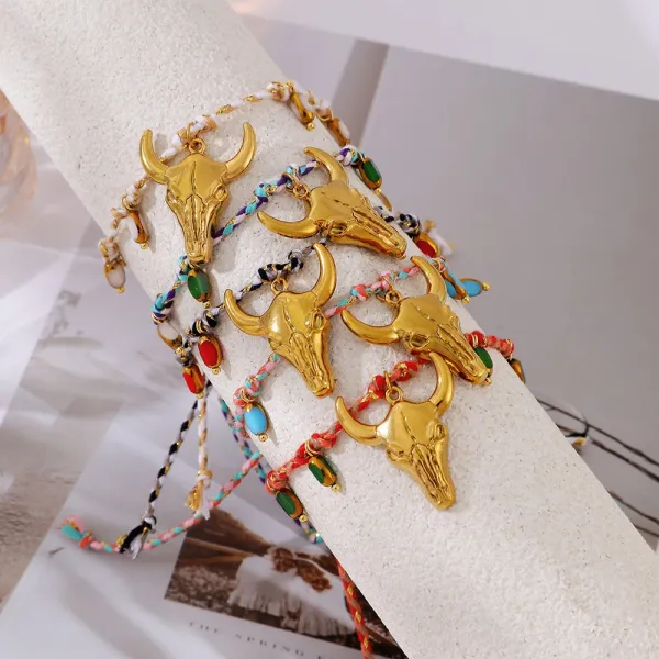 A little western. A little boho. A whole lot of personality.  Featuring a statement bull skull charm, colorful braided details and delicate bead accents, this bracelet instantly gives your everyday look a more adventurous edge.