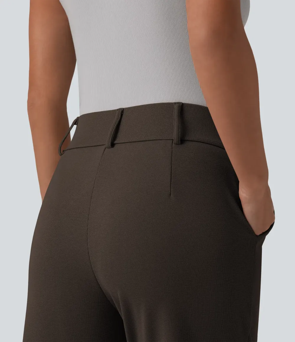  - Tapered office trousers with a high waist, side pockets and waffle fabric