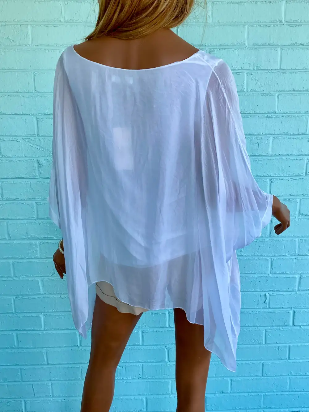 Relaxed Sleeveless Poncho