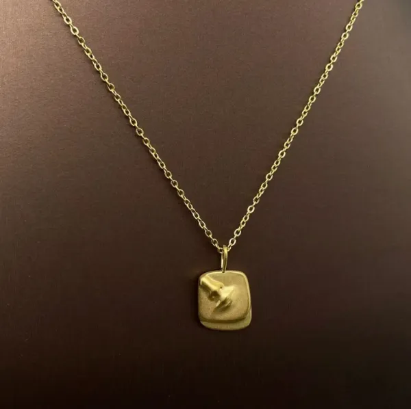 Abstract Face and Body Charm Necklace
