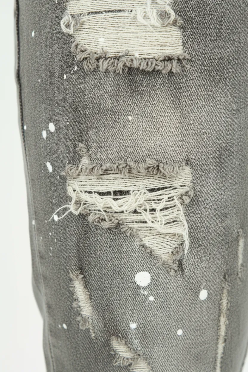 Distressed Slim Fit Paint Splatter Five Pocket Jeans