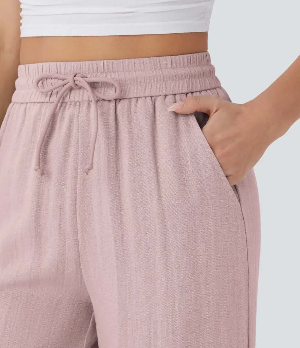 2026🔥  Wide-leg, flowing, high-waisted trousers with drawstring, side pockets and a linen look