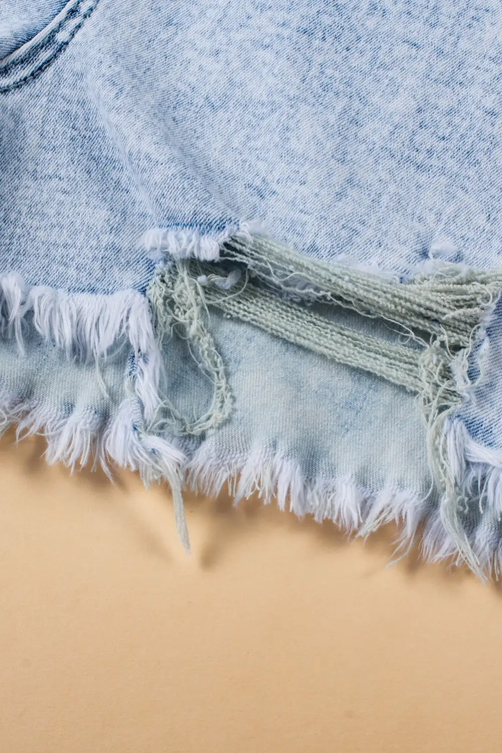 Light Blue Acid Wash Crossed Raw