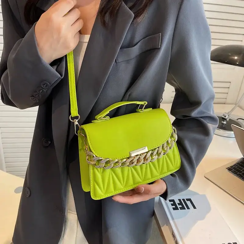 Evening Statement: Designer Chain-Detail Handbag