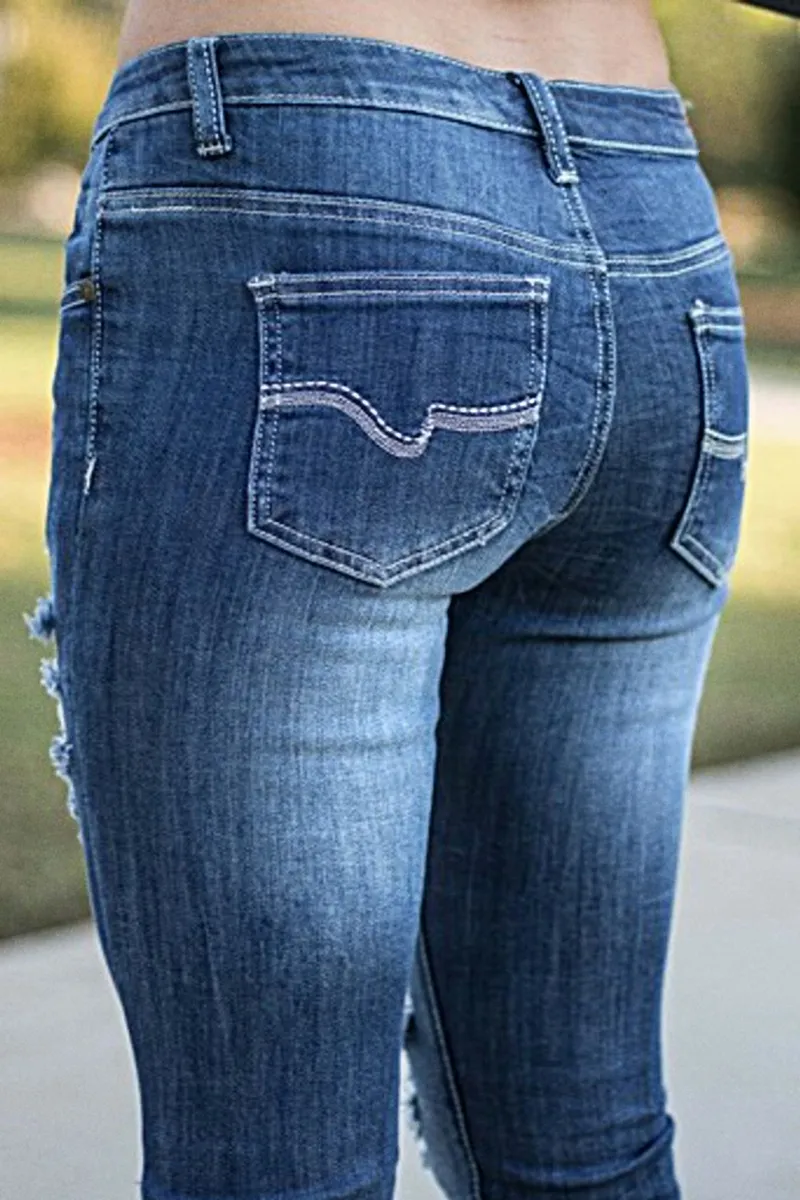 Distressed Low Rise Skinny Jeans