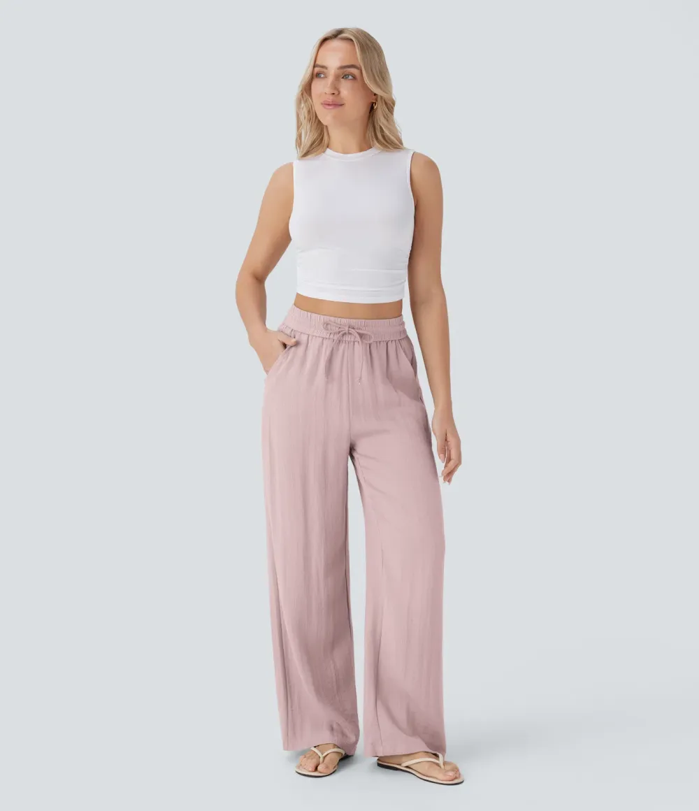 2026🔥  Wide-leg, flowing, high-waisted trousers with drawstring, side pockets and a linen look