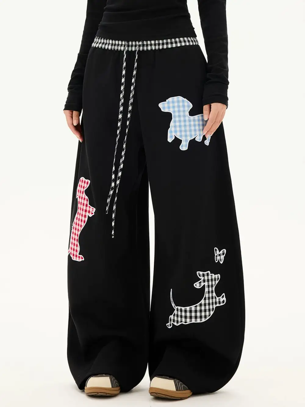 Curved-Cut Plaid Graphic Pants