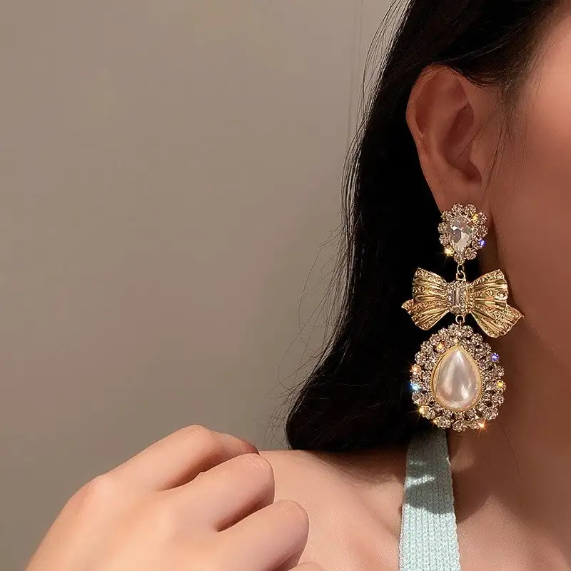 Bow Pearl Statement Earrings
