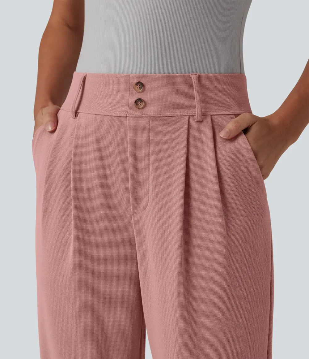  - Tapered office trousers with a high waist, side pockets and waffle fabric