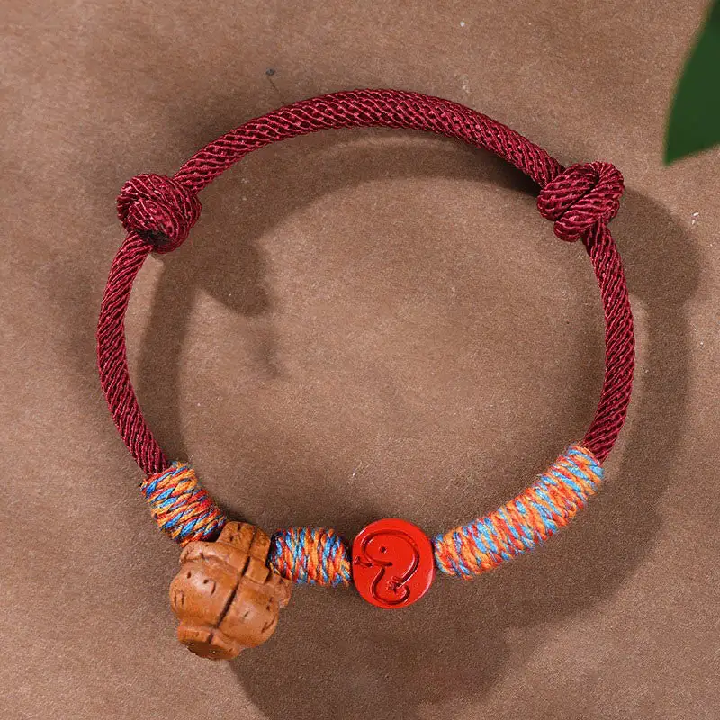 Handmade String Peach Pit Cinnabar Bracelet
