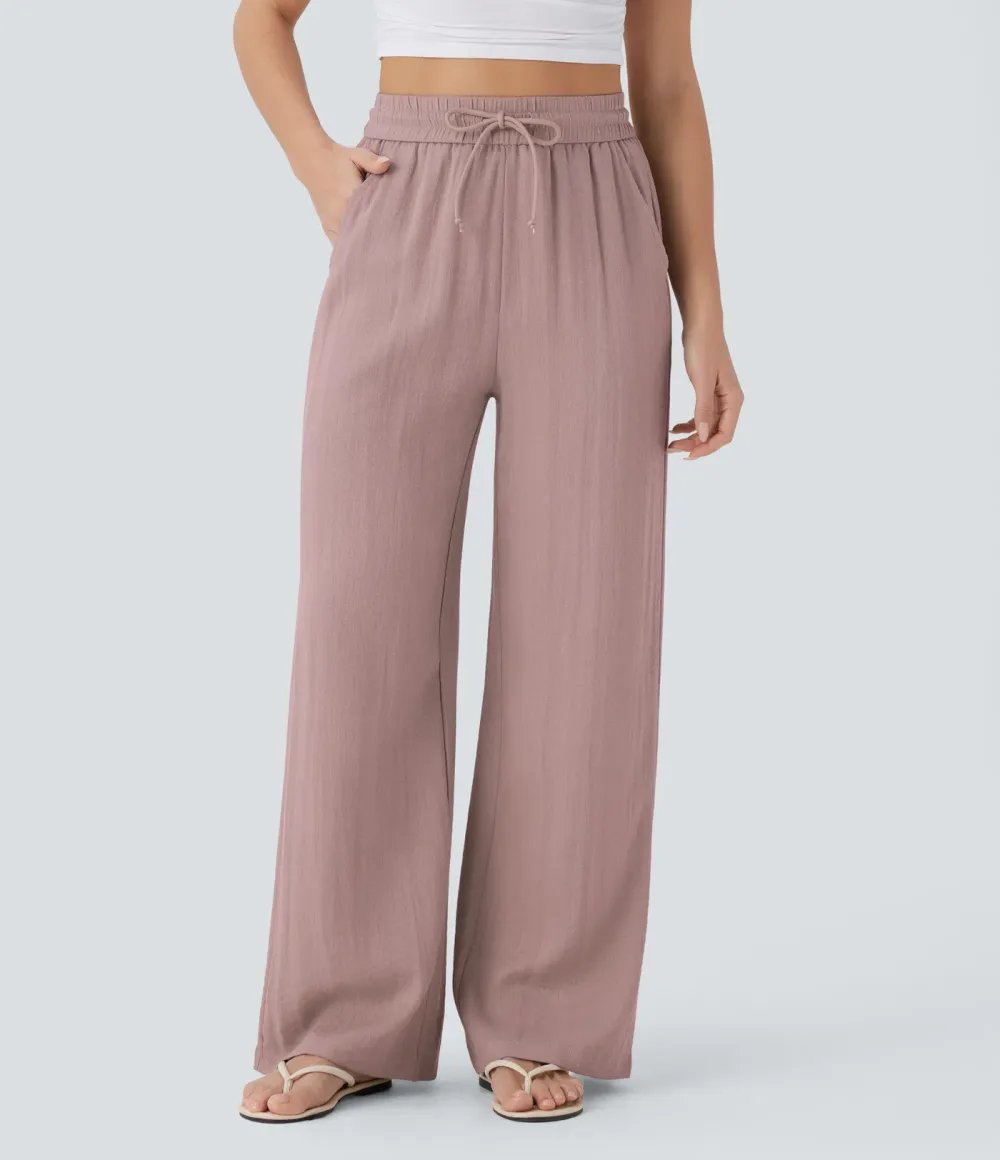 2026🔥  Wide-leg, flowing, high-waisted trousers with drawstring, side pockets and a linen look