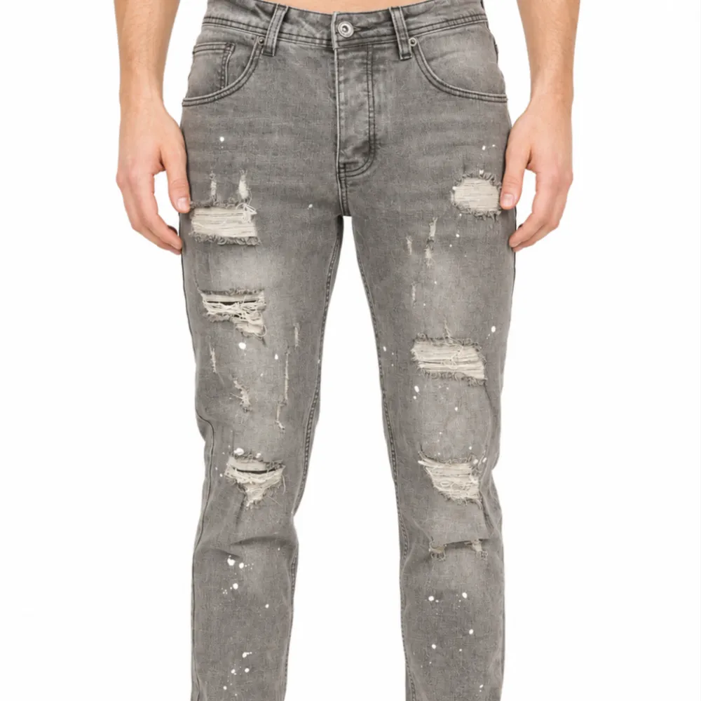 Distressed Slim Fit Paint Splatter Five Pocket Jeans