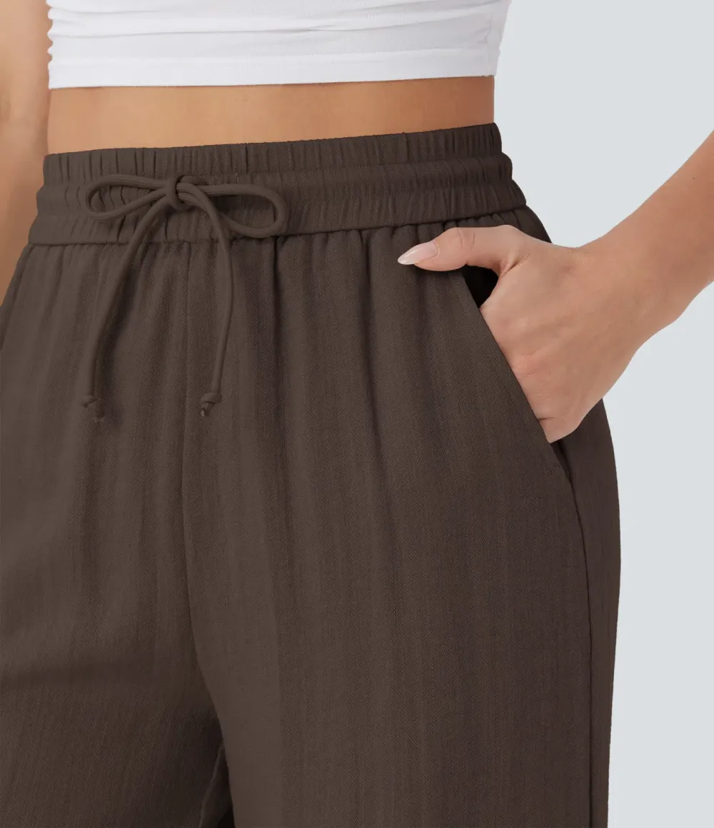 2026🔥  Wide-leg, flowing, high-waisted trousers with drawstring, side pockets and a linen look