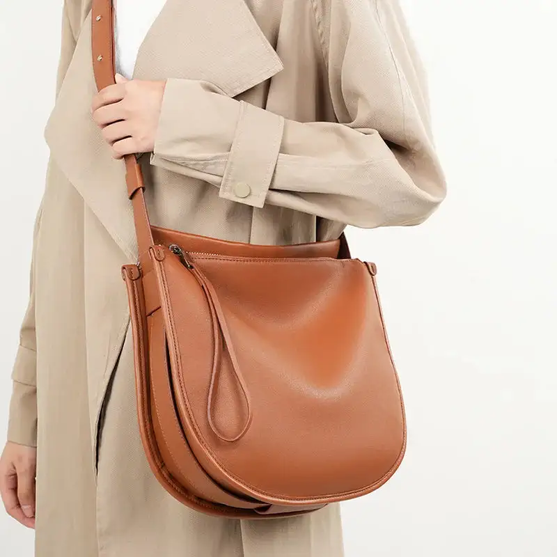 Premium Texture: High-Quality Genuine Leather Zippered Tote