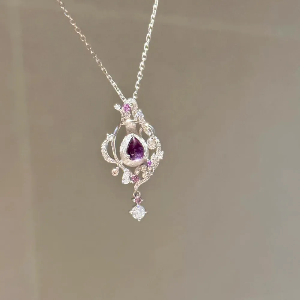 ✨ A little sparkle makes every moment feel special. Featuring a captivating purple teardrop stone surrounded by delicate shimmering details, this necklace adds an elegant touch to any look. 💜  Perfect for date nights, special occasions, or simply treatin