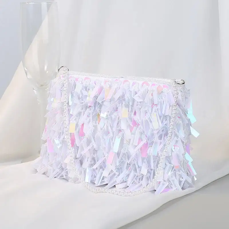Glamorous Detail: Rhinestone Tassel Messenger Bag