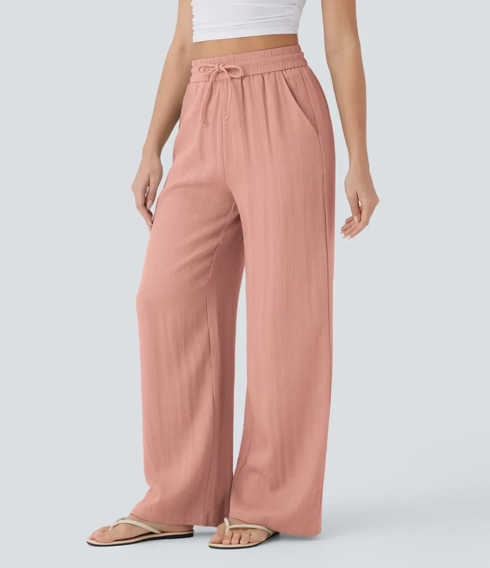 2026🔥  Wide-leg, flowing, high-waisted trousers with drawstring, side pockets and a linen look