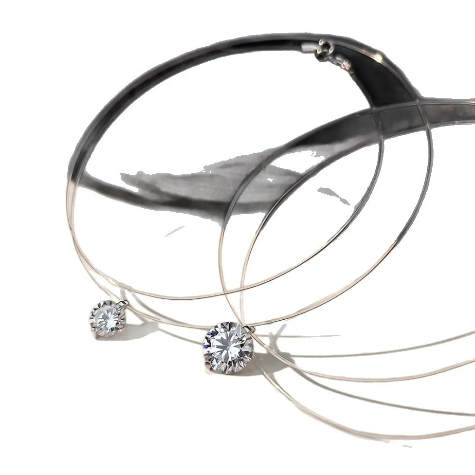 ✨ It looks like it’s floating on your skin. A barely-there clear necklace paired with a sparkling solitaire pendant creates the perfect minimalist look. Delicate, elegant, and effortless enough to wear every day. 💎  Wear it alone for a clean look or laye