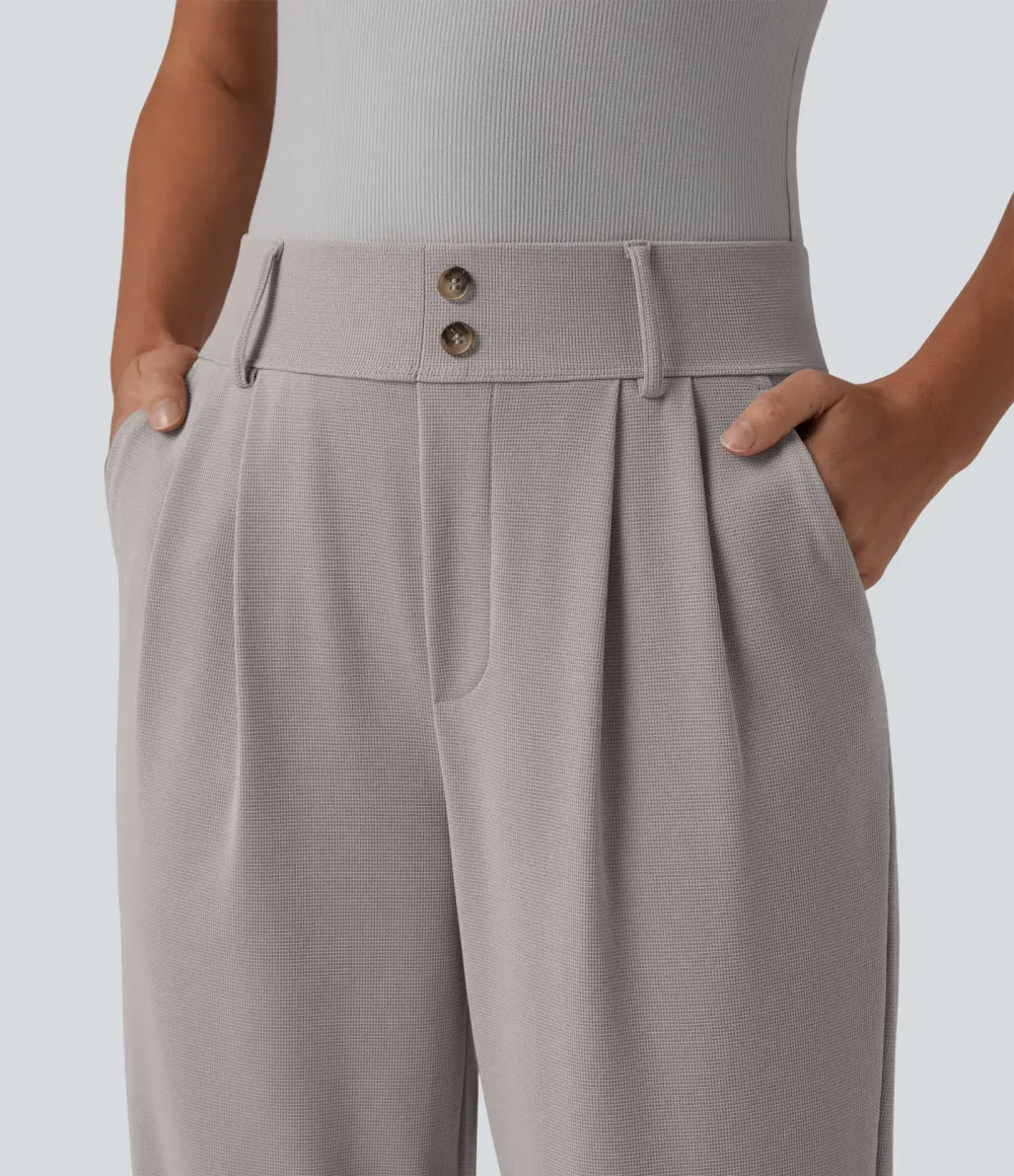  - Tapered office trousers with a high waist, side pockets and waffle fabric