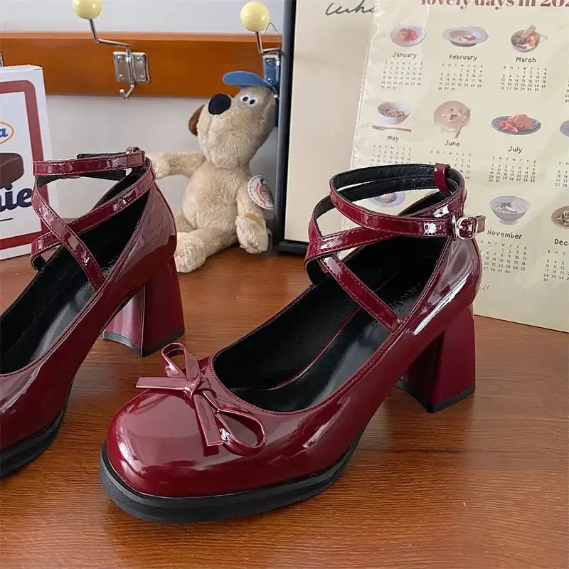 Bow-Detail Mary-Jane Round-Toe Pumps