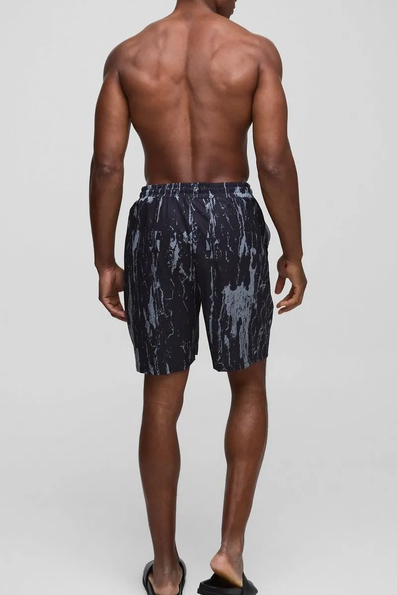 Daily Regular Fit Mid Length Abstract Leaf Print Swim Trunks