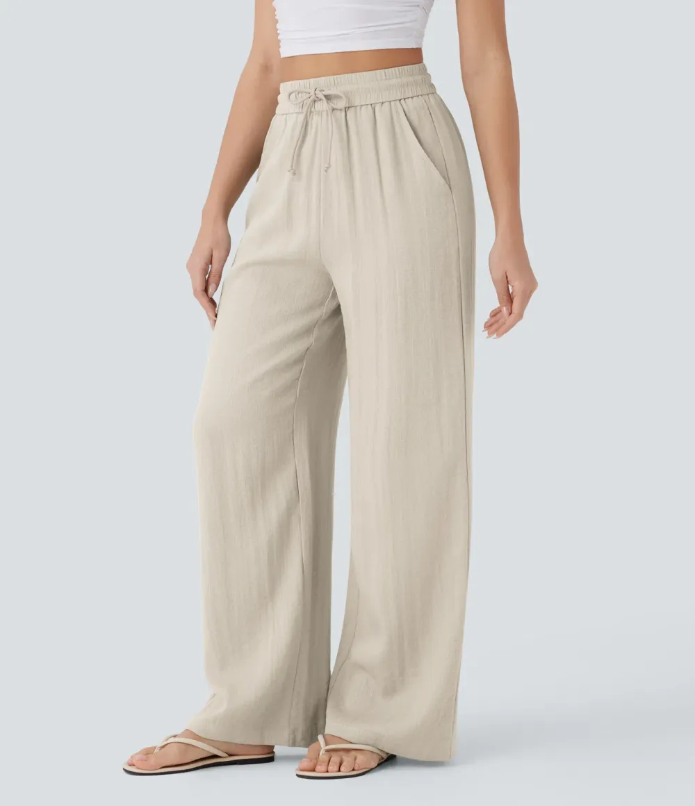 2026🔥  Wide-leg, flowing, high-waisted trousers with drawstring, side pockets and a linen look