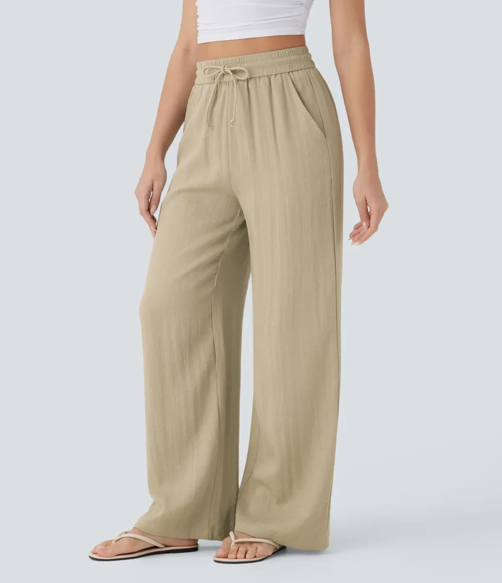 2026🔥  Wide-leg, flowing, high-waisted trousers with drawstring, side pockets and a linen look