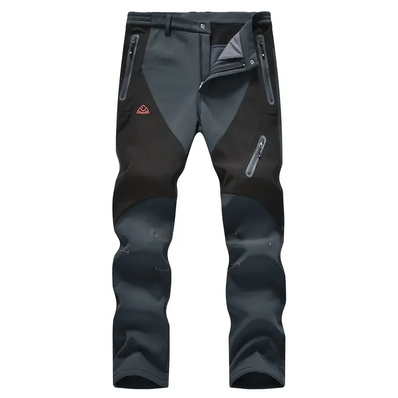 Men's waterproof, insulated pants—suitable for cold-weather hiking and winter skiing.