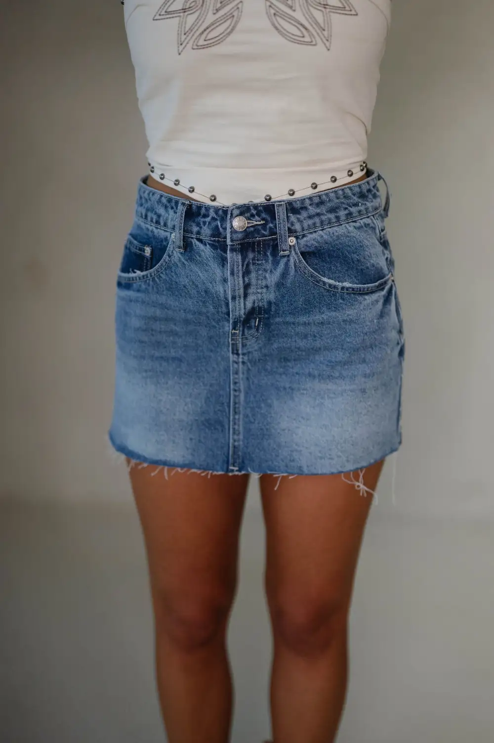 Denim High Rise Distressed Mini Skirt