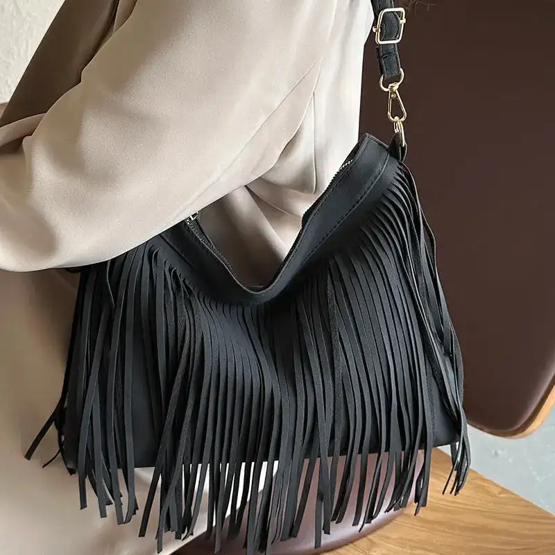 Elegant Detail: Tassel Red Leather Mini Crossbody Bag