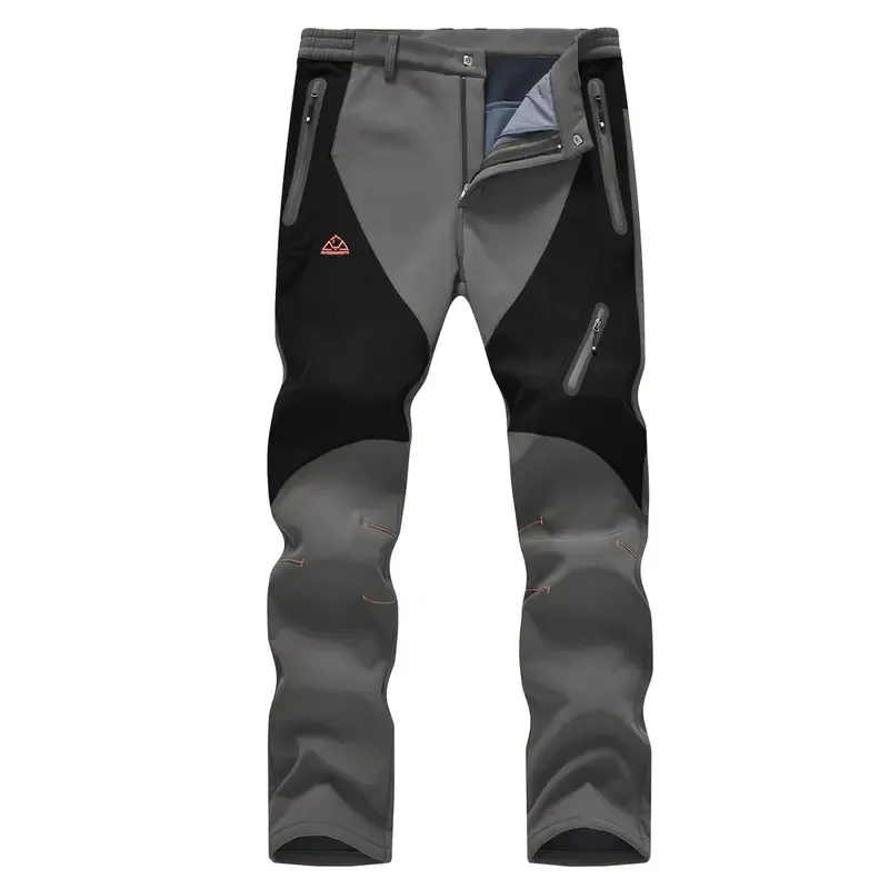 Men's waterproof, insulated pants—suitable for cold-weather hiking and winter skiing.