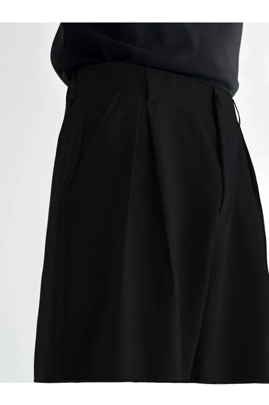 Relaxed Pleated Trousers