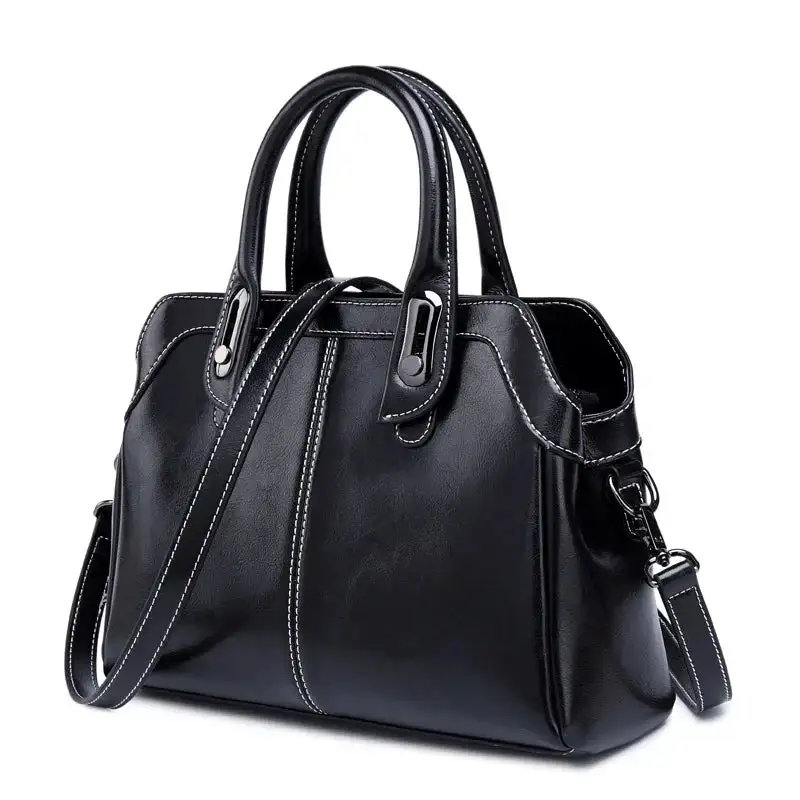 Structured Heritage: Genuine Leather Buckle-Handle Handbag