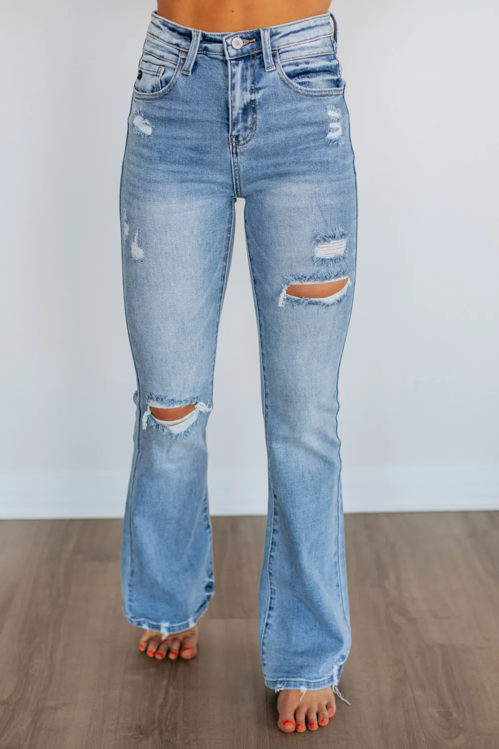 Women's High Rise Flared Leg Fading Whiskering Jeans