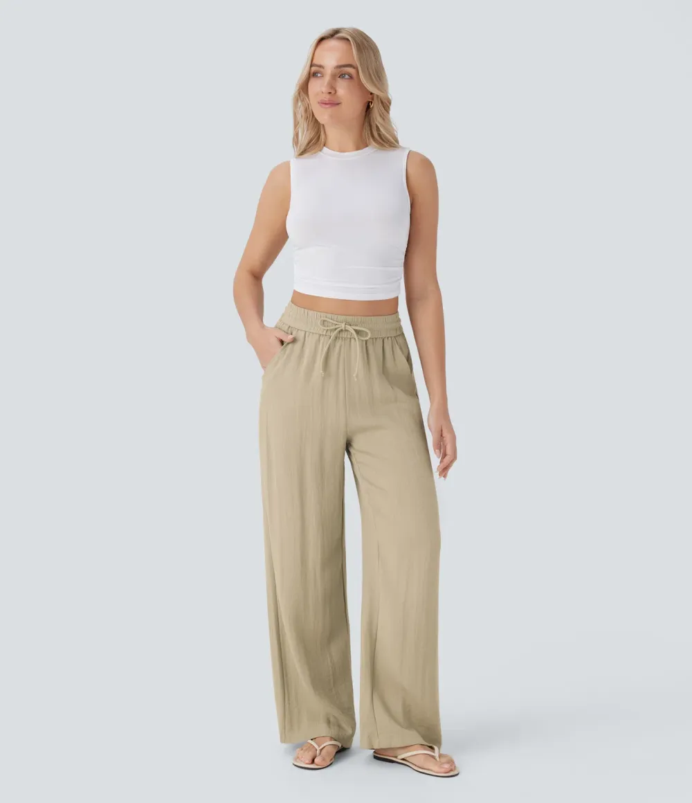 2026🔥  Wide-leg, flowing, high-waisted trousers with drawstring, side pockets and a linen look