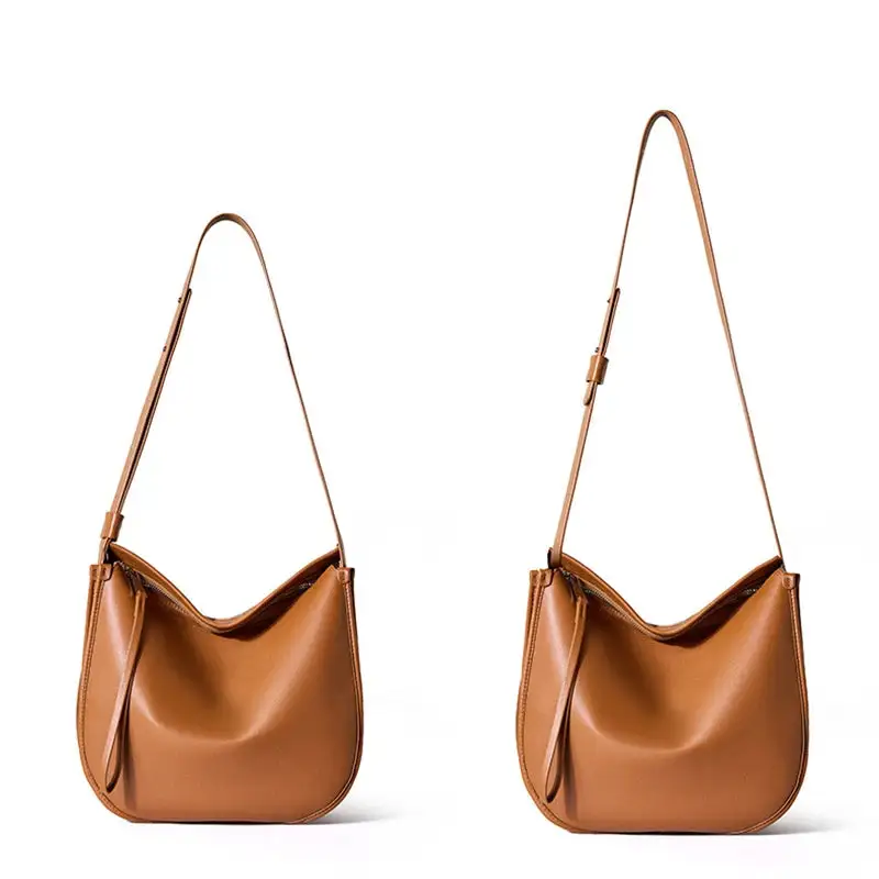 Premium Texture: High-Quality Genuine Leather Zippered Tote