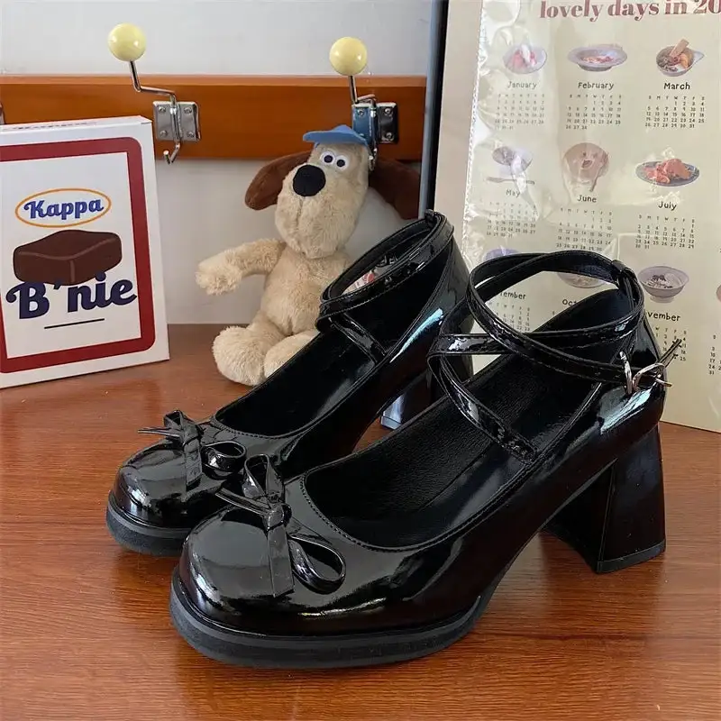 Bow-Detail Mary-Jane Round-Toe Pumps