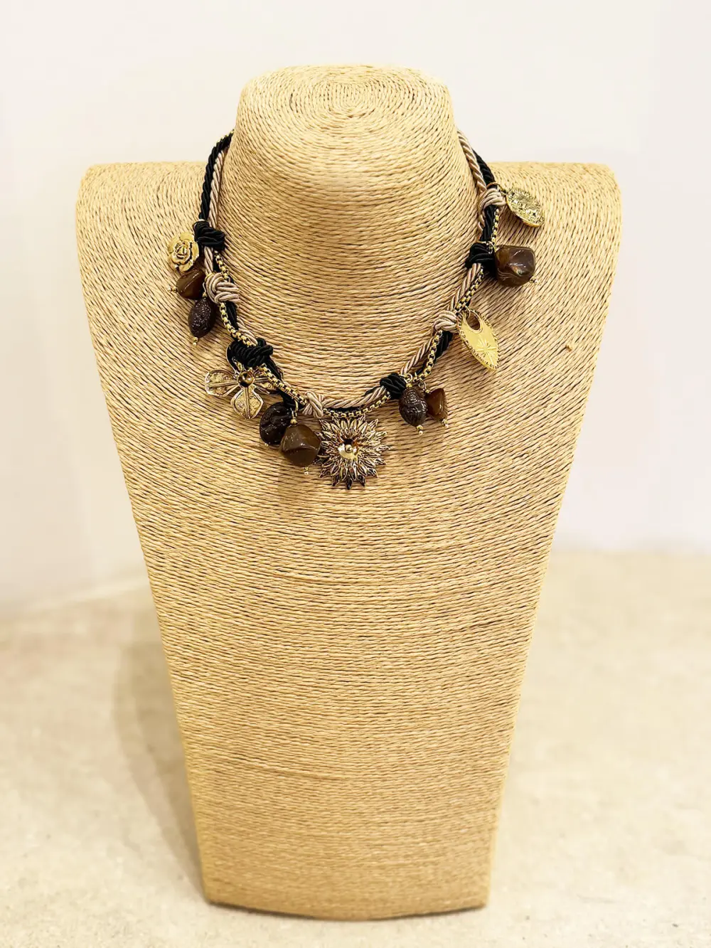Necklace Featuring Cord Charm Detail