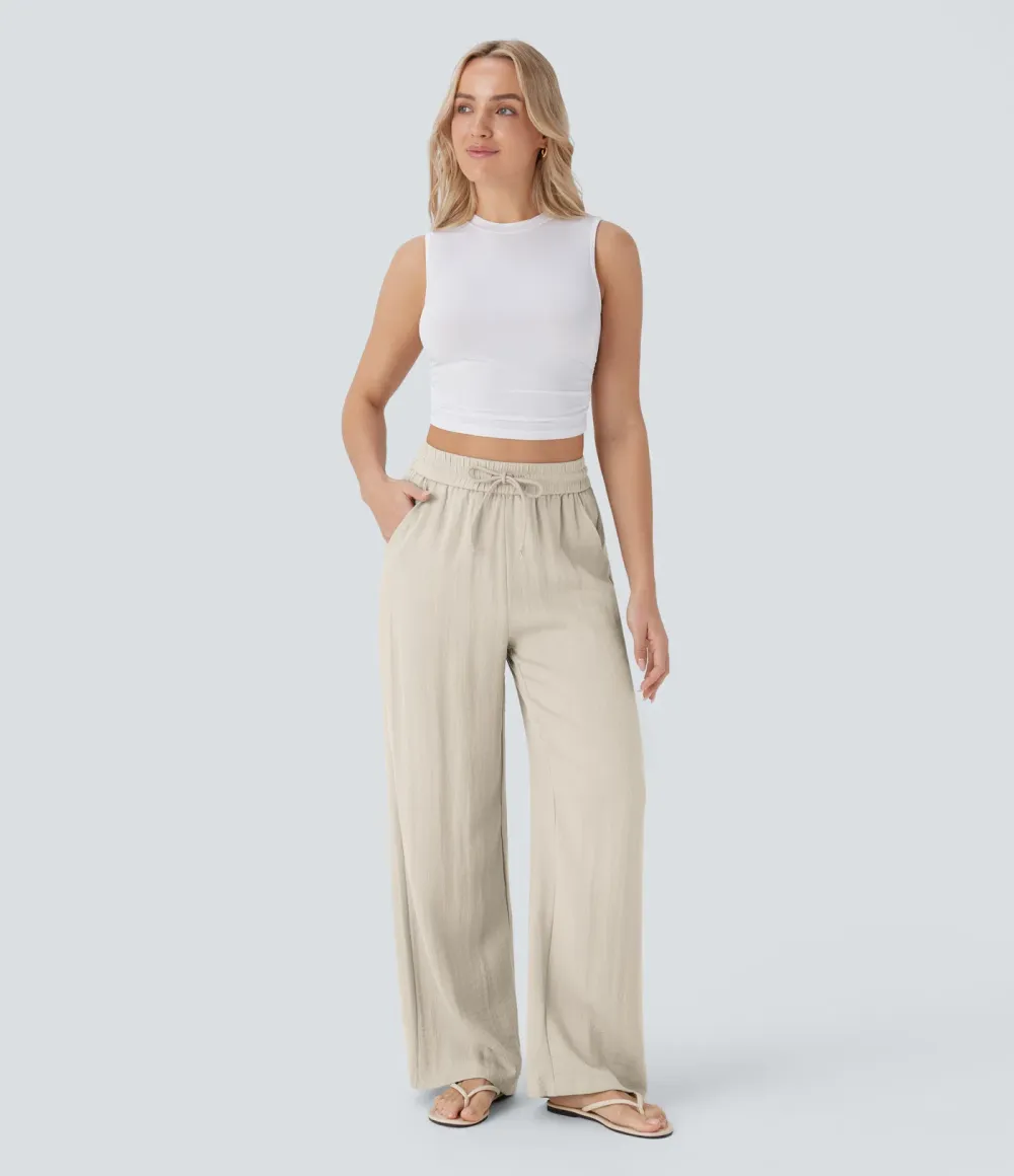 2026🔥  Wide-leg, flowing, high-waisted trousers with drawstring, side pockets and a linen look