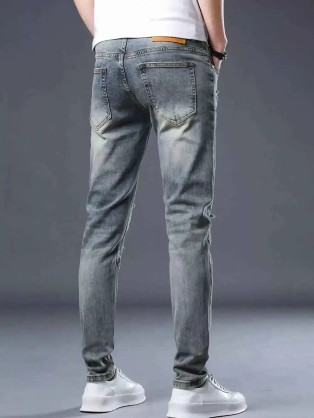 Relaxed Distressed Slim Fit Jeans