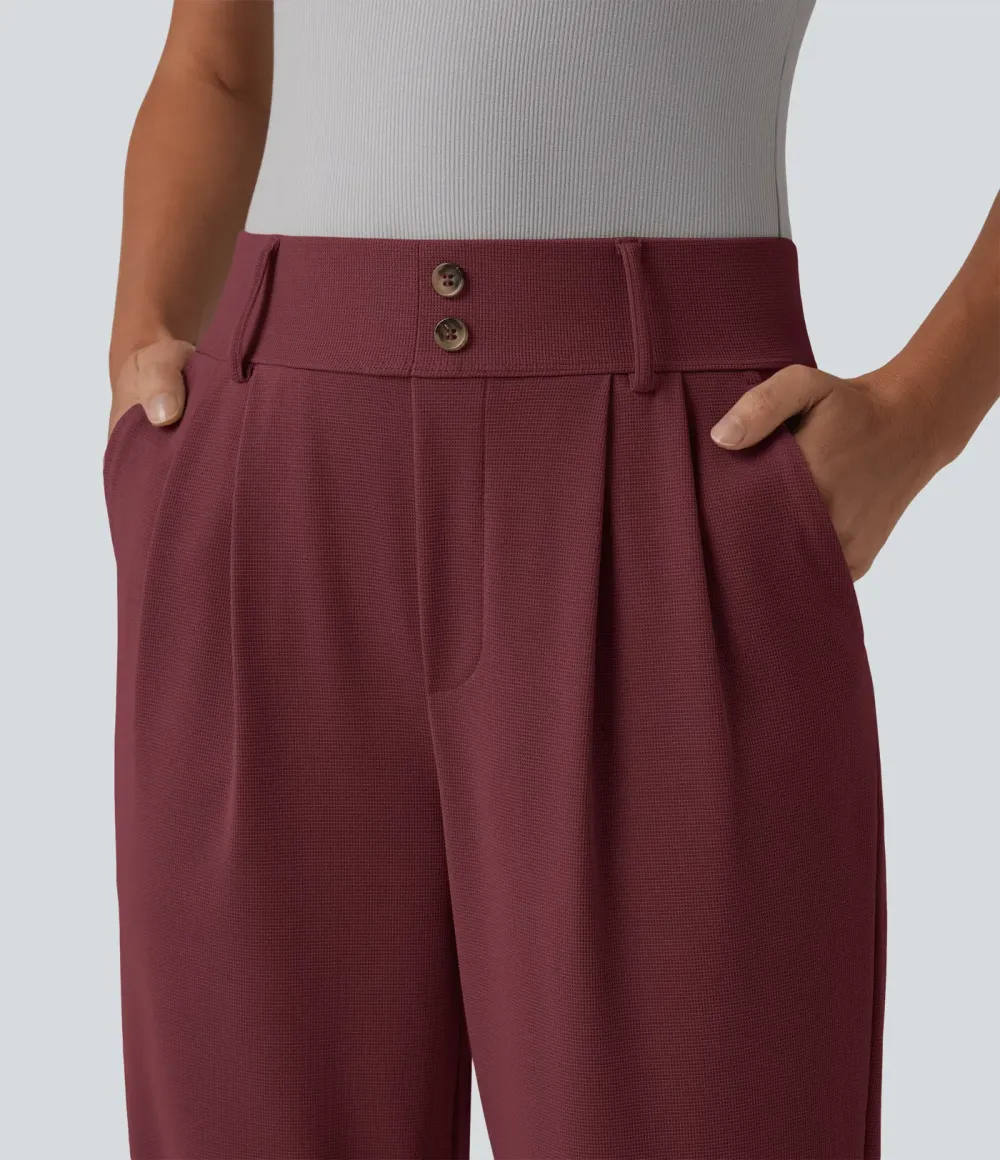  - Tapered office trousers with a high waist, side pockets and waffle fabric