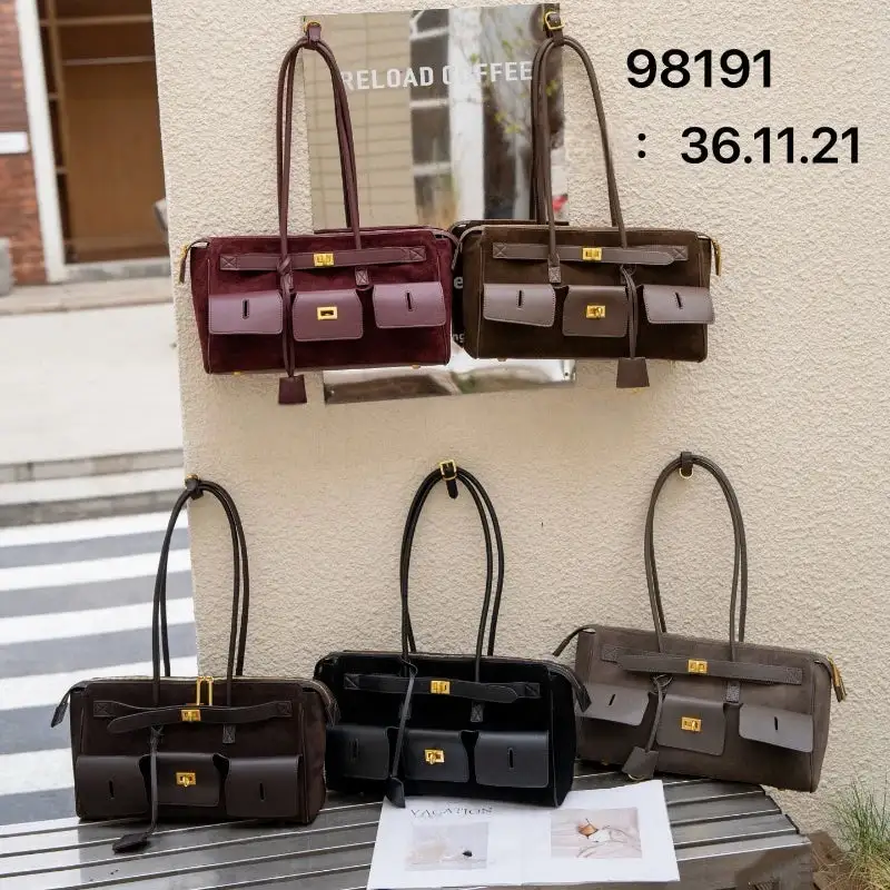 Statement Detail: Genuine Leather Buckle-Handle Handbag