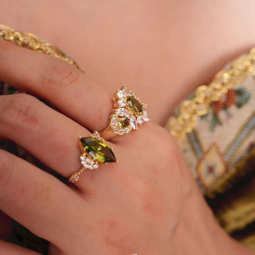 ✨ A little green. A lot of glamour. Designed with striking olive-green stones and sparkling accents, these statement rings bring an elegant vintage touch to any look. 💚