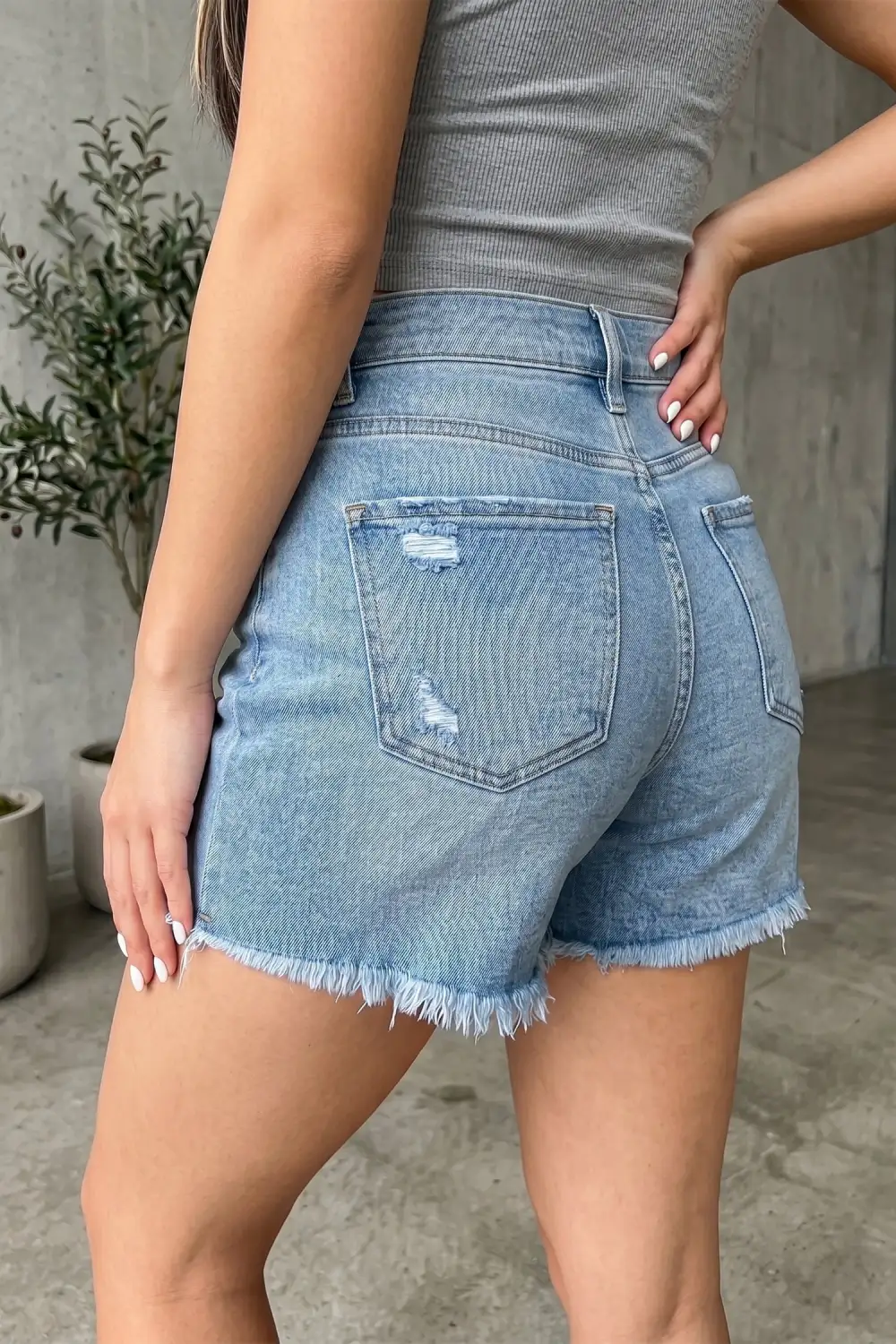 Asymmetric Raw Hem Distressed Whiskery Denim Shorts