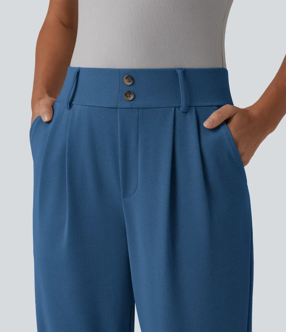  - Tapered office trousers with a high waist, side pockets and waffle fabric