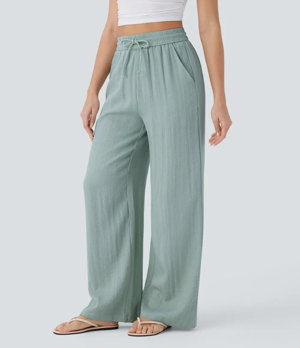 2026🔥  Wide-leg, flowing, high-waisted trousers with drawstring, side pockets and a linen look