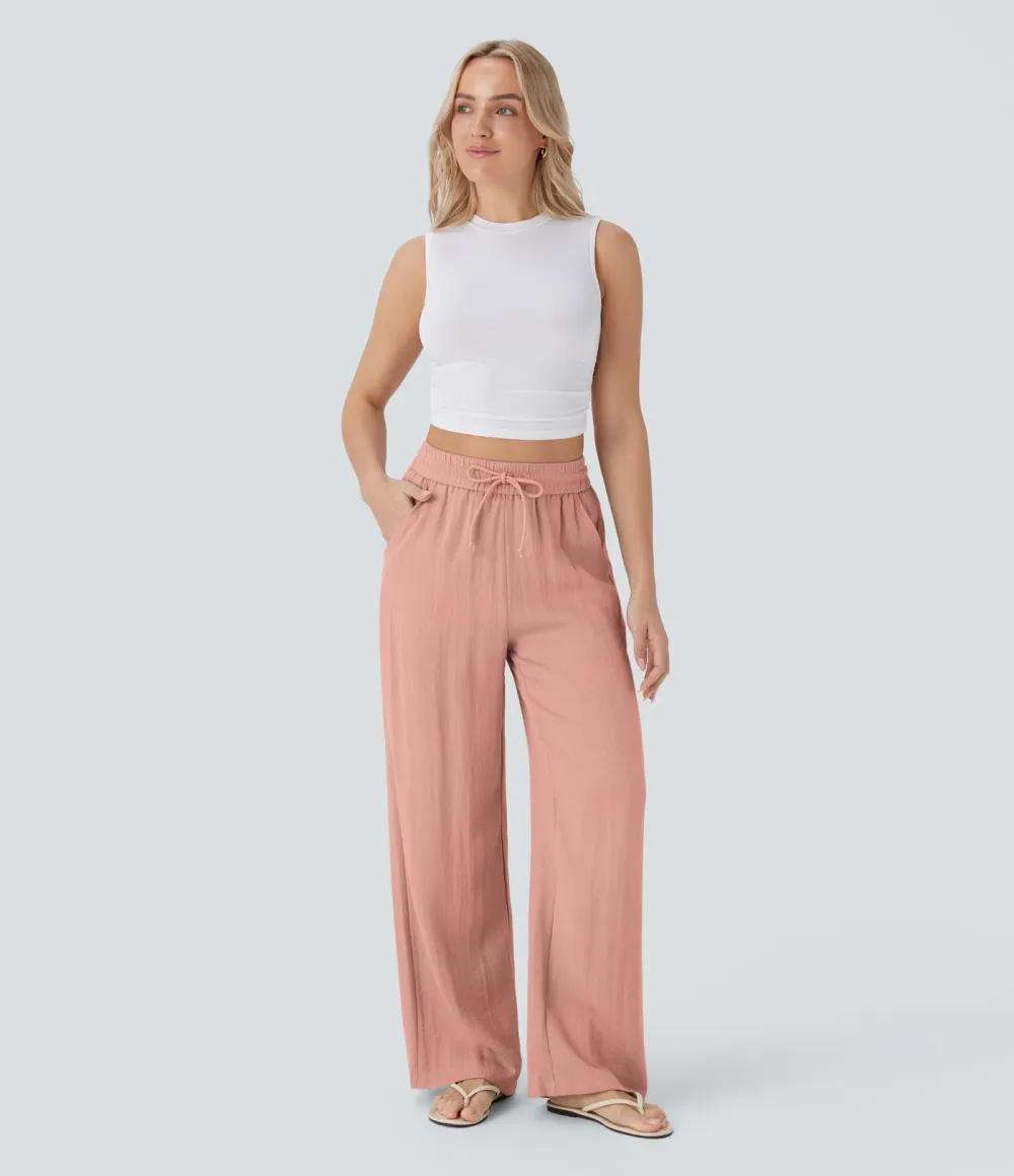2026🔥  Wide-leg, flowing, high-waisted trousers with drawstring, side pockets and a linen look