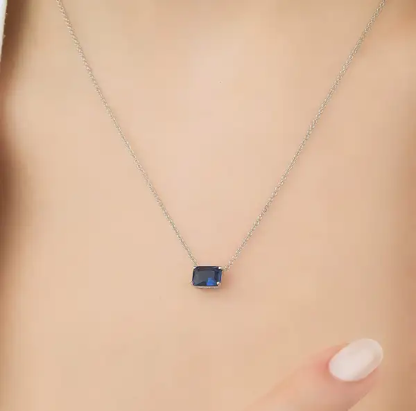 Dainty Emerald Cut Sapphire Solitaire Necklace
