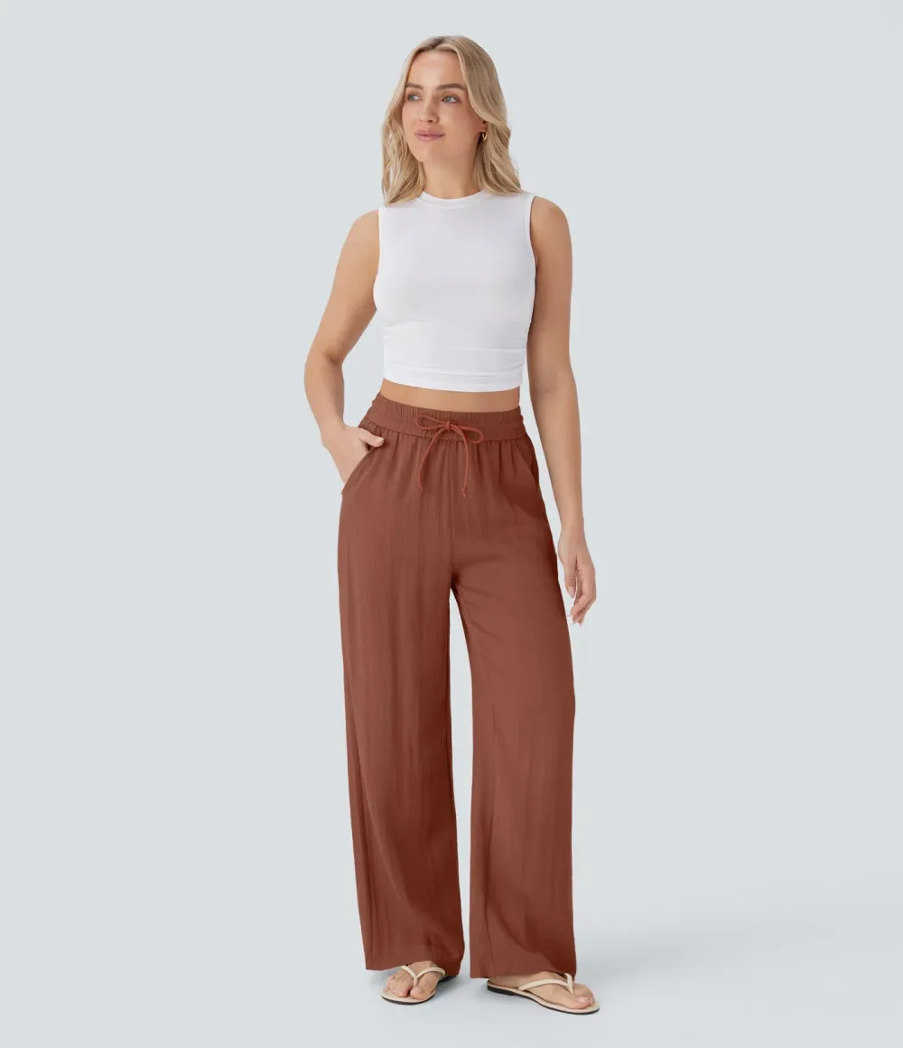 2026🔥  Wide-leg, flowing, high-waisted trousers with drawstring, side pockets and a linen look